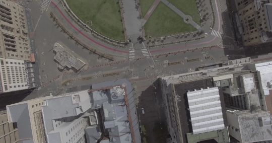 Fly over roofs to Church Square