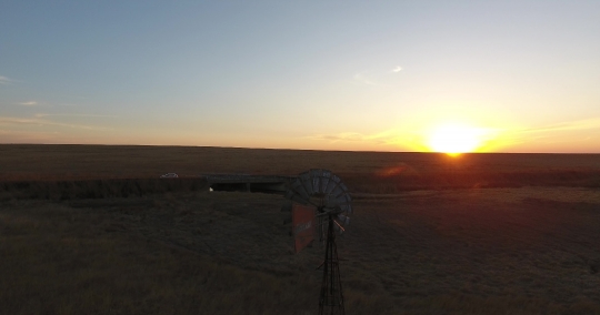 The Windmill and the Sunset